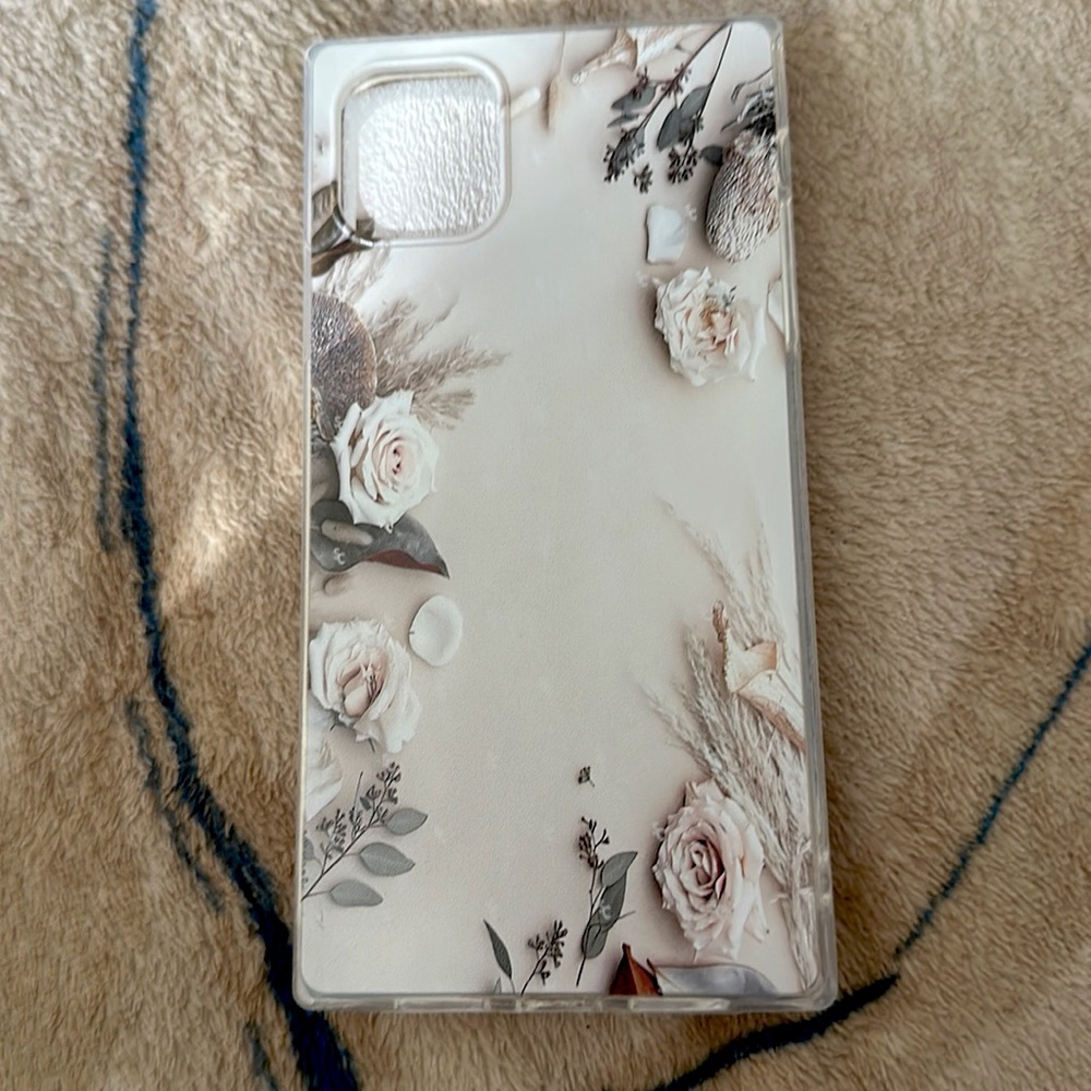 iPhone 11 case. Square shaped and is beautiful